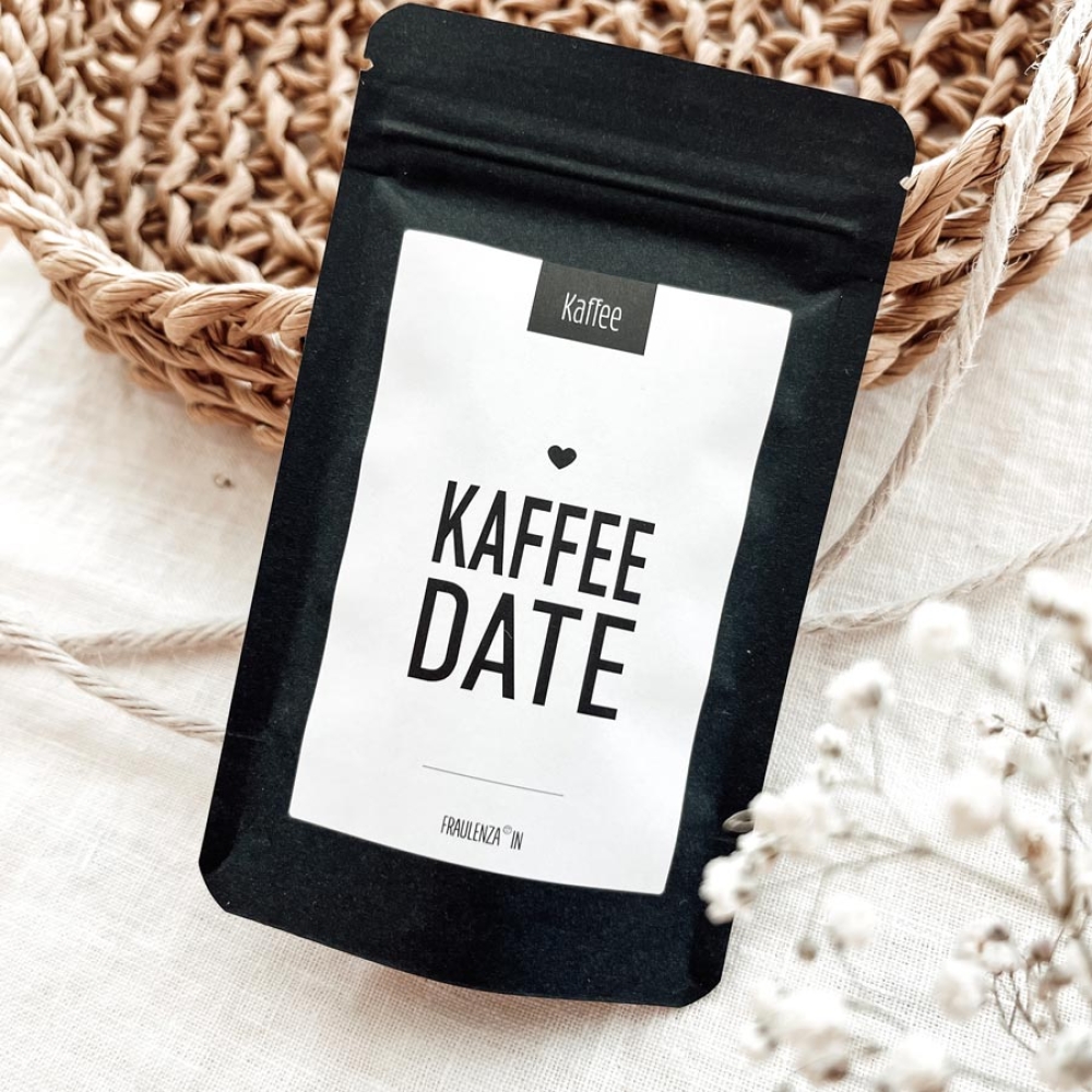 Geschenkbeutel schwarz mit der Aufschrift Kaffeedate